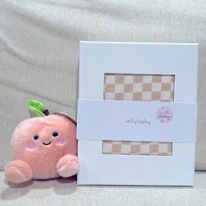 Madi Nelson x Solly Baby Collab wrap. Limited edition cream checkered print!